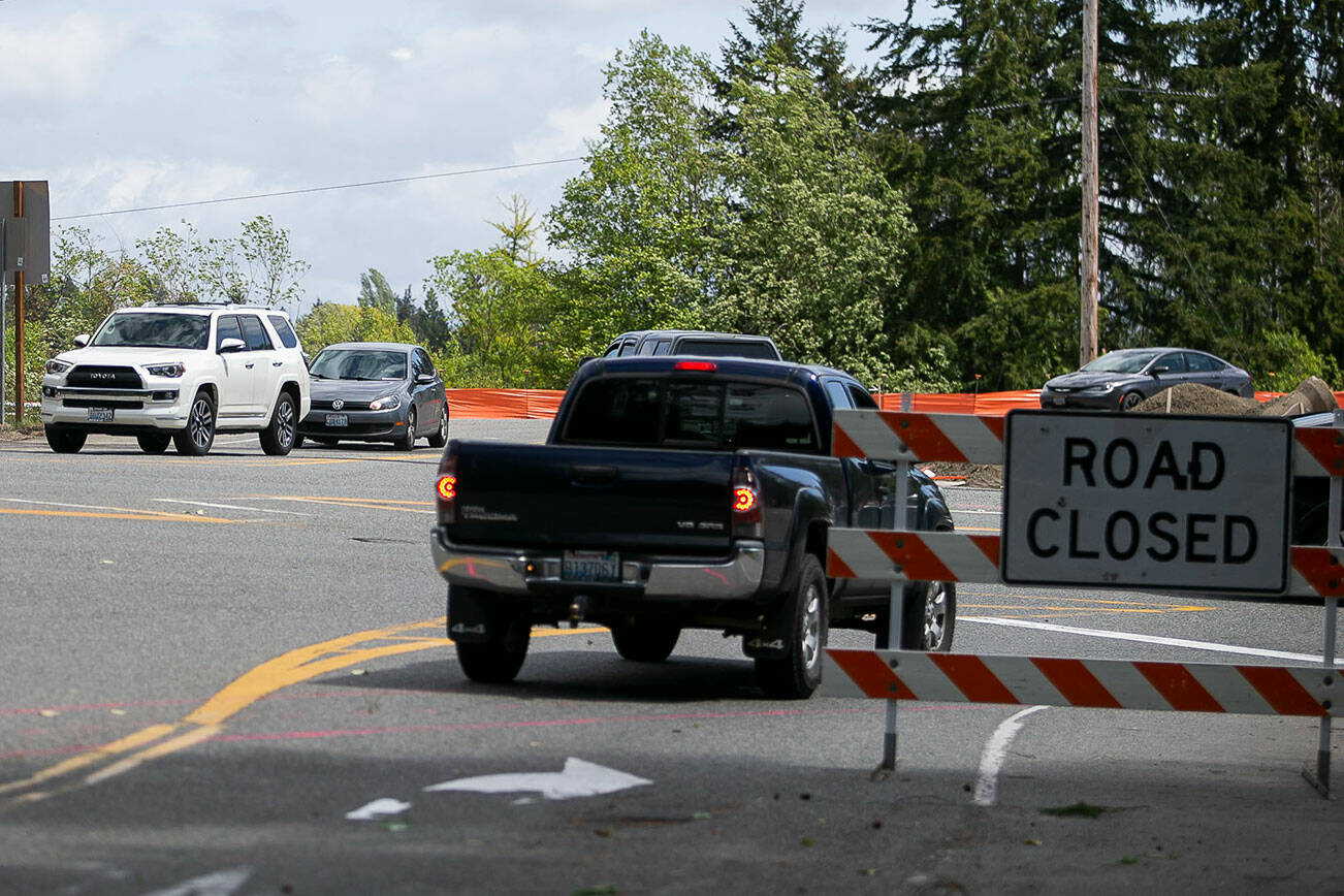 Cars wait to turn onto Highway 9 from Bickford Avenue on Wednesday, May 18, 2022 in Snohomish, Washington. (Olivia Vanni / The Herald)