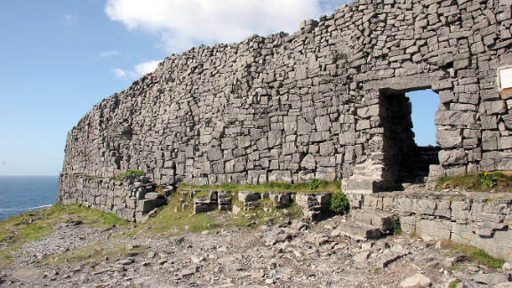 At the prehistoric fortress of Dun Aengus, the dramatic west cliffs of Ireland meet the turbulent sea as Europe comes to an abrupt end. (Rick Steves’ Europe)