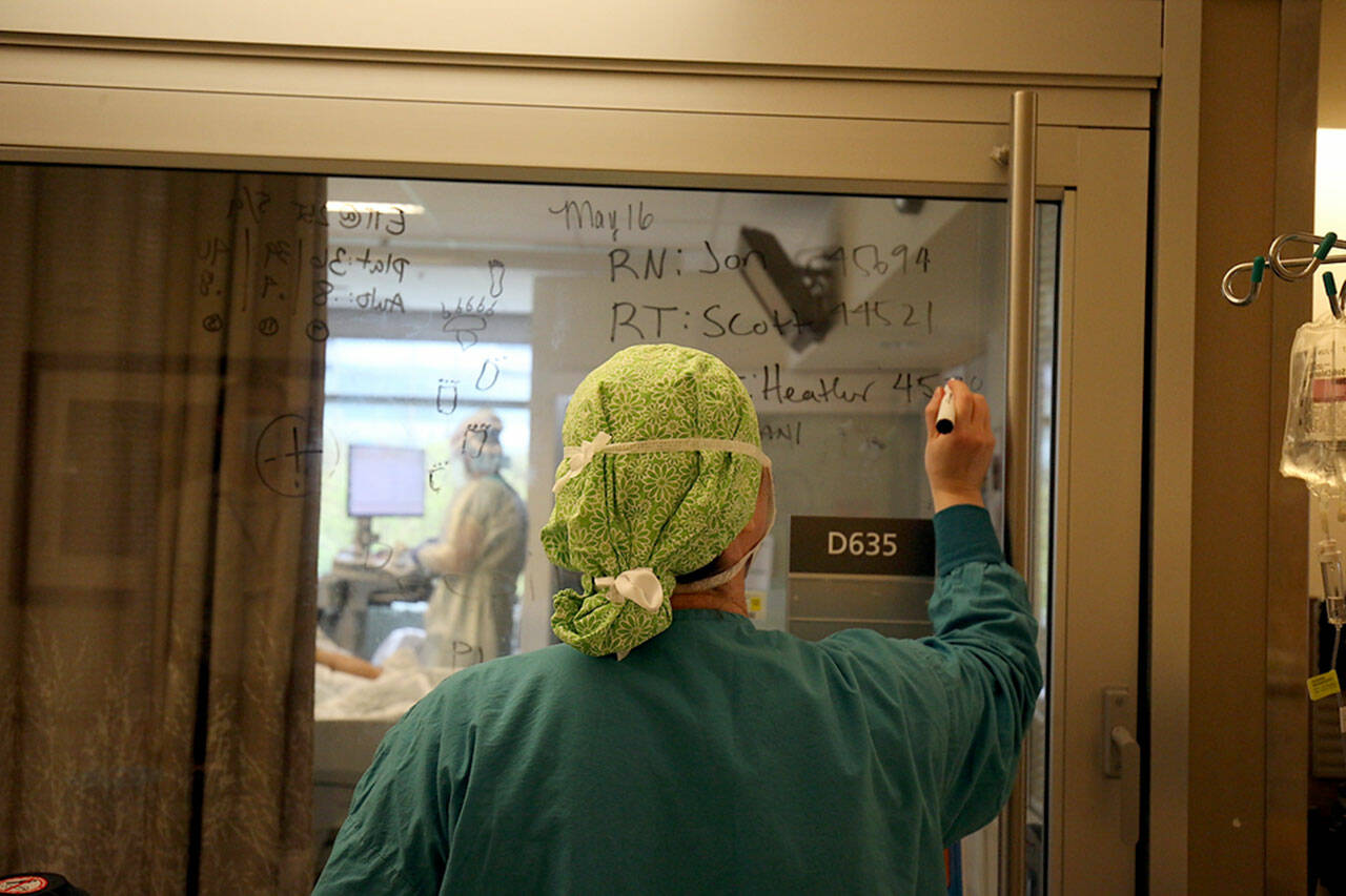 The covid-19 ward at Providence Regional Medical Center Everett in May 2020, three months into the pandemic. (Andy Bronson / Herald file)