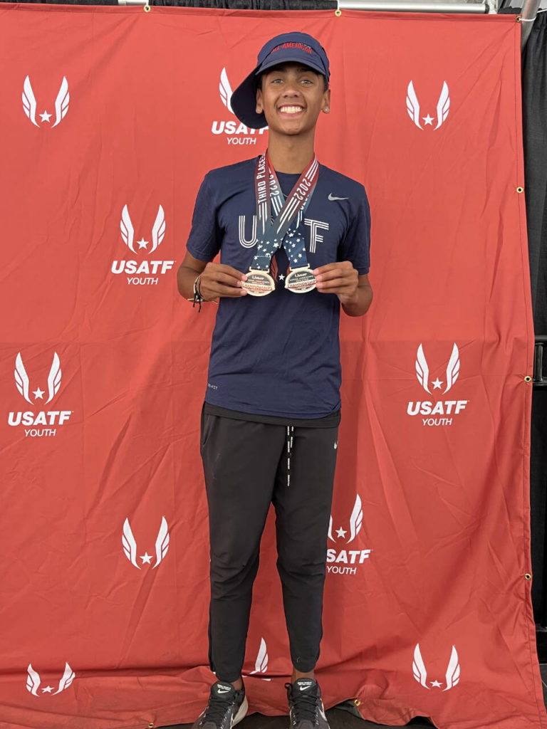 Lake Stevens native Grant Buckmiller displays his medals at the USATF National Junior Olympic Track and Field Championships in Sacramento, Calif. (Provided photo)
