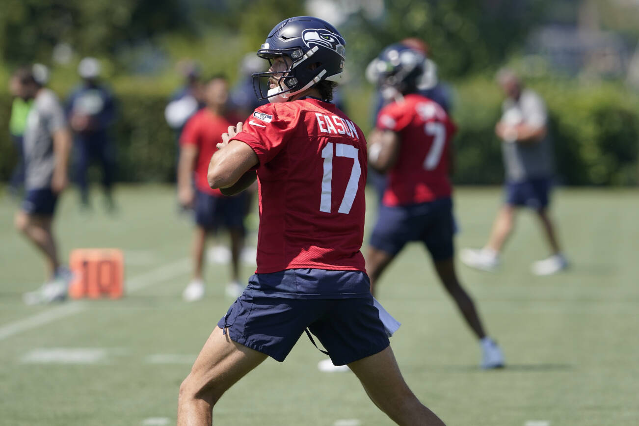 Seattle Seahawks quarterback Jacob Eason passes during NFL football practice Thursday, July 28, 2022, in Renton, Wash. (AP Photo/Ted S. Warren)