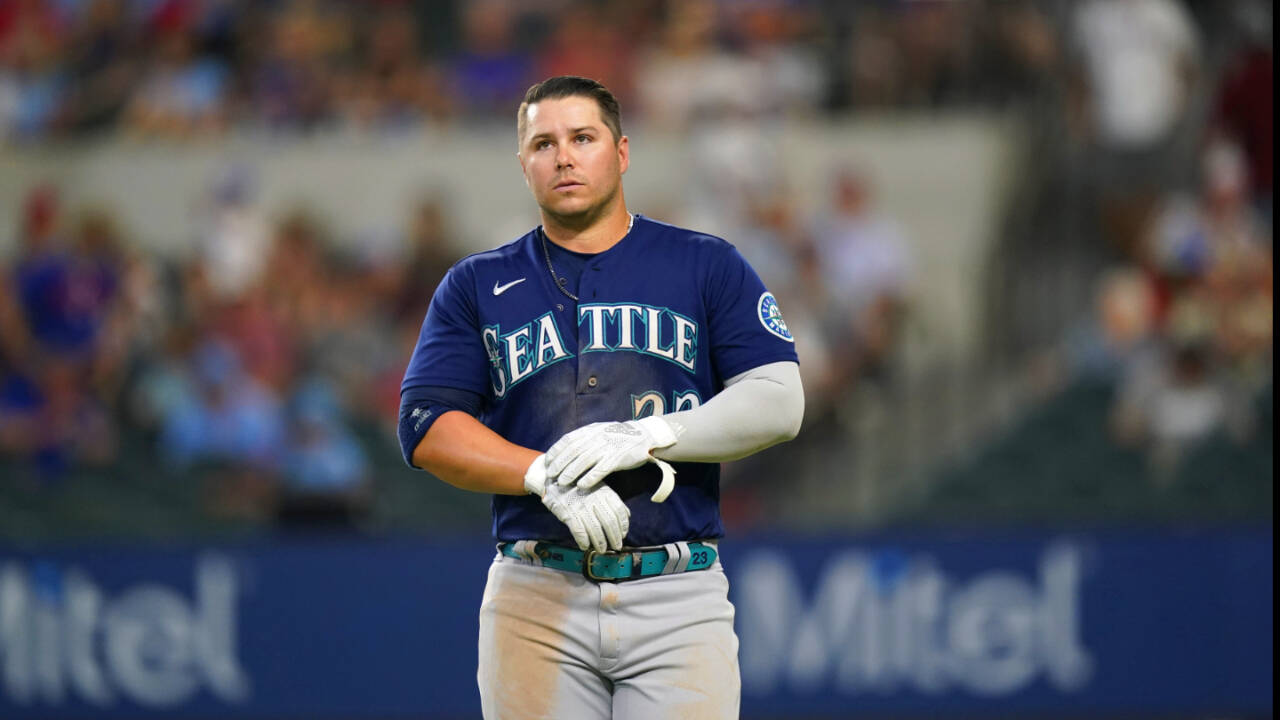 Seattle Mariners Ty France walks on the field during Sunday’s game against the Texas Rangers in Arlington, Texas. (AP Photo/LM Otero)