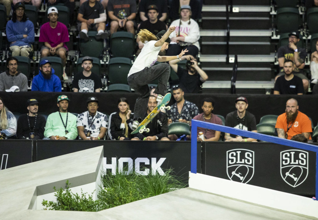 Poe Pinson of the United States jumps across a gap to grind one of the rails on the course during the Street League Skateboarding women’s final on Sunday, Aug. 14, 2022 in Everett, Washington. (Olivia Vanni / The Herald)