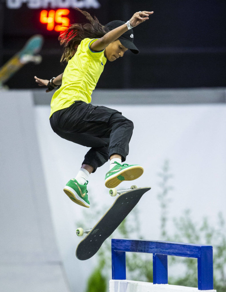 Rayssa Leal kick flips into a grind during the Street League Skateboarding women’s final on Sunday, Aug. 14, 2022 in Everett, Washington. (Olivia Vanni / The Herald)