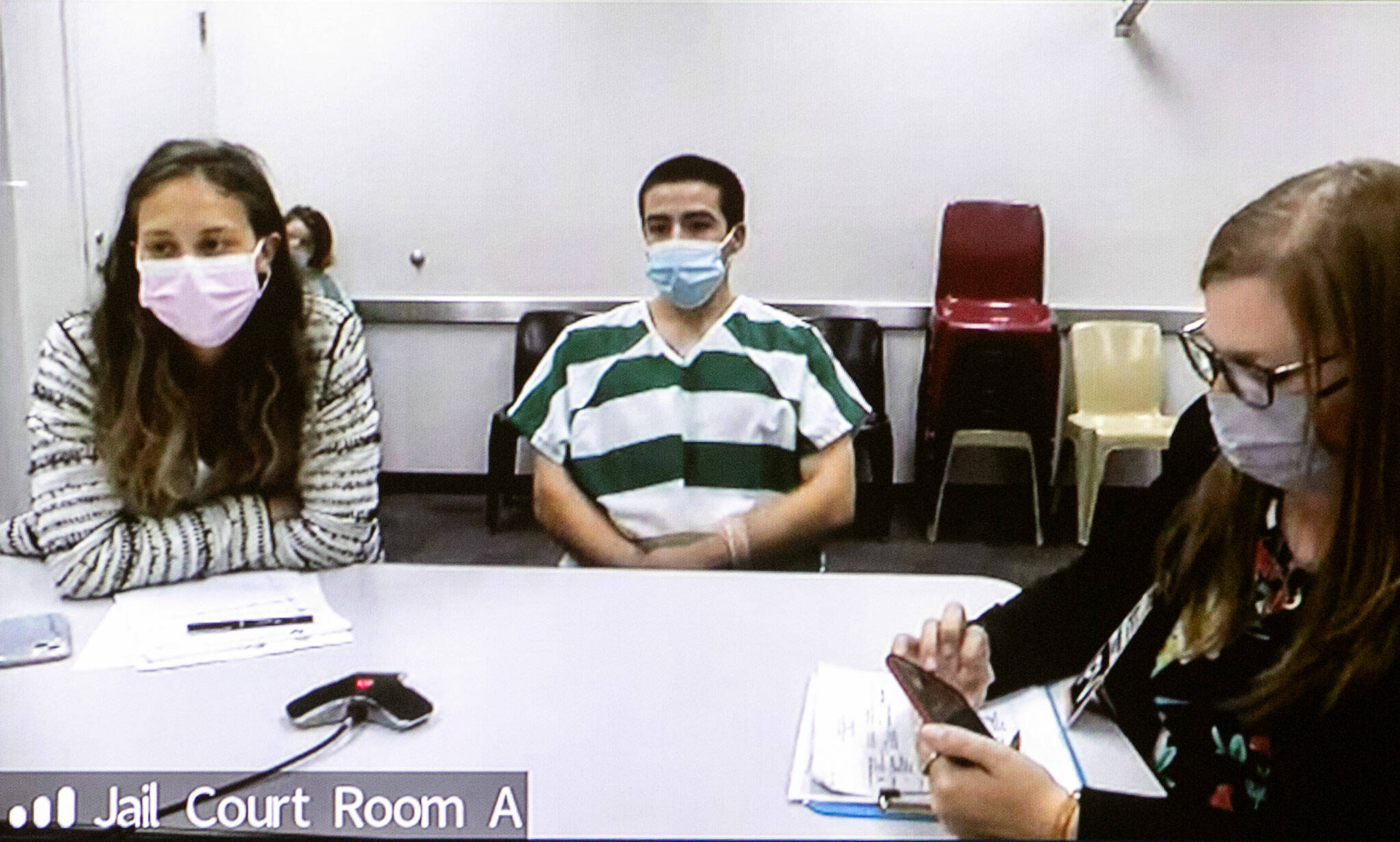 Jose Espinoza Aguilar appears in court via video for arraignment Wednesday, at Snohomish County Superior Court in Everett. (Ryan Berry / The Herald)