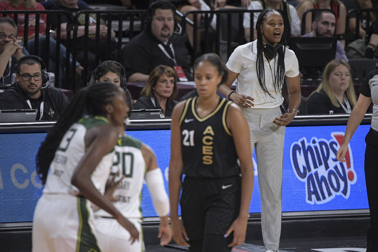 Seattle Storm head coach Noelle Quinn directs her team during the first half of a WNBA basketball game against the Las Vegas Aces, Sunday, Aug. 14, 2022, in Las Vegas. (AP Photo/Sam Morris)