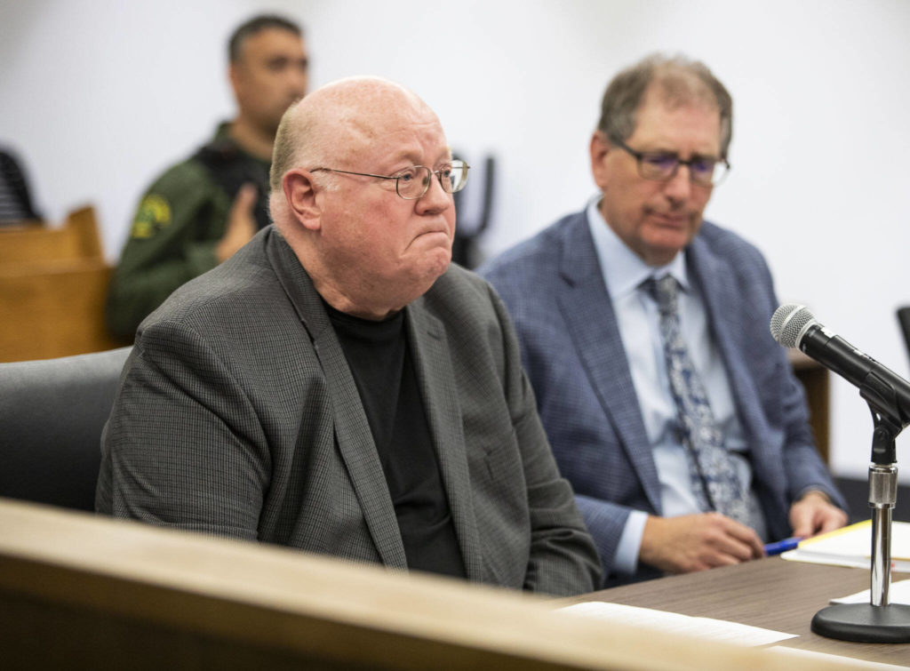 Timothy Brakke, father to Daniel Brakke, reads a statement to the court during the sentencing of Daniel Rodrigues at the Snohomish County Courthouse on Wednesday, in Everett. (Olivia Vanni / The Herald)
