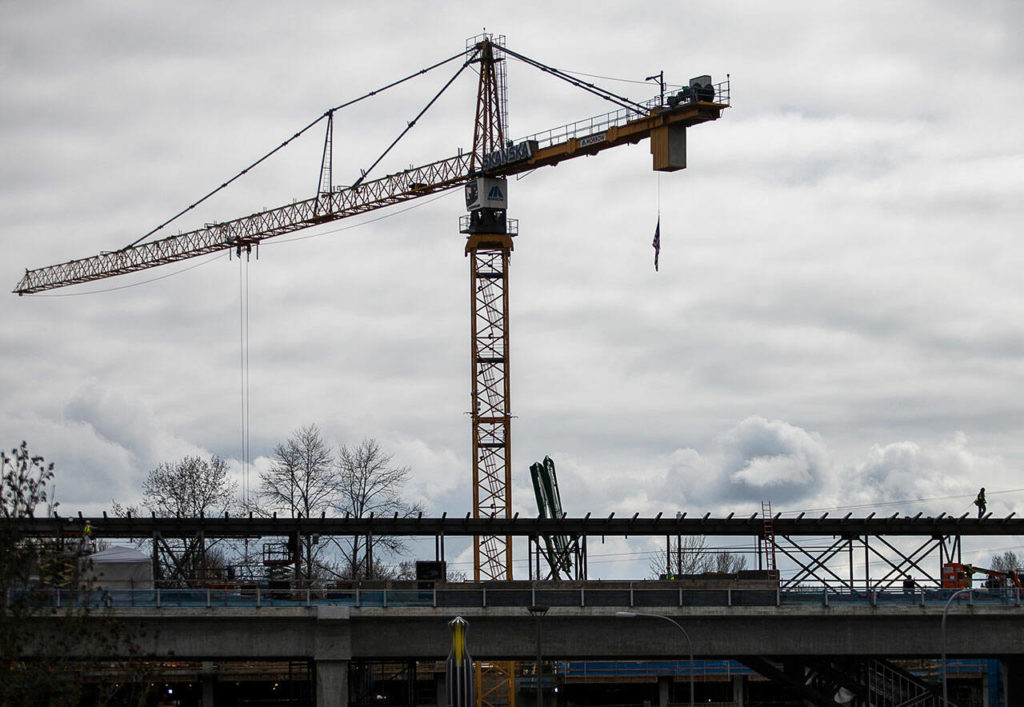 The Lynnwood Link light rail service’s start could be delayed up to 6 months after holdups caused by the pandemic and a concrete delivery strike earlier this year. (Olivia Vanni / Herald file)
