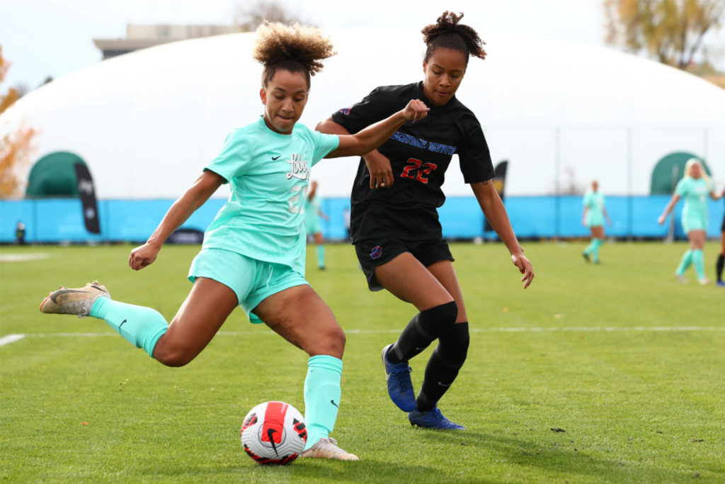 Jadyn Edwards (left) controls the ball during the Mountain West Conference championship game on Nov. 6, 2021, in Boise, Idaho. Edwards, a Jackson High School graduate, is The Herald’s 2021-22 Woman of the Year in Sports. (C. Morgan Engel/NCAA Photos)
