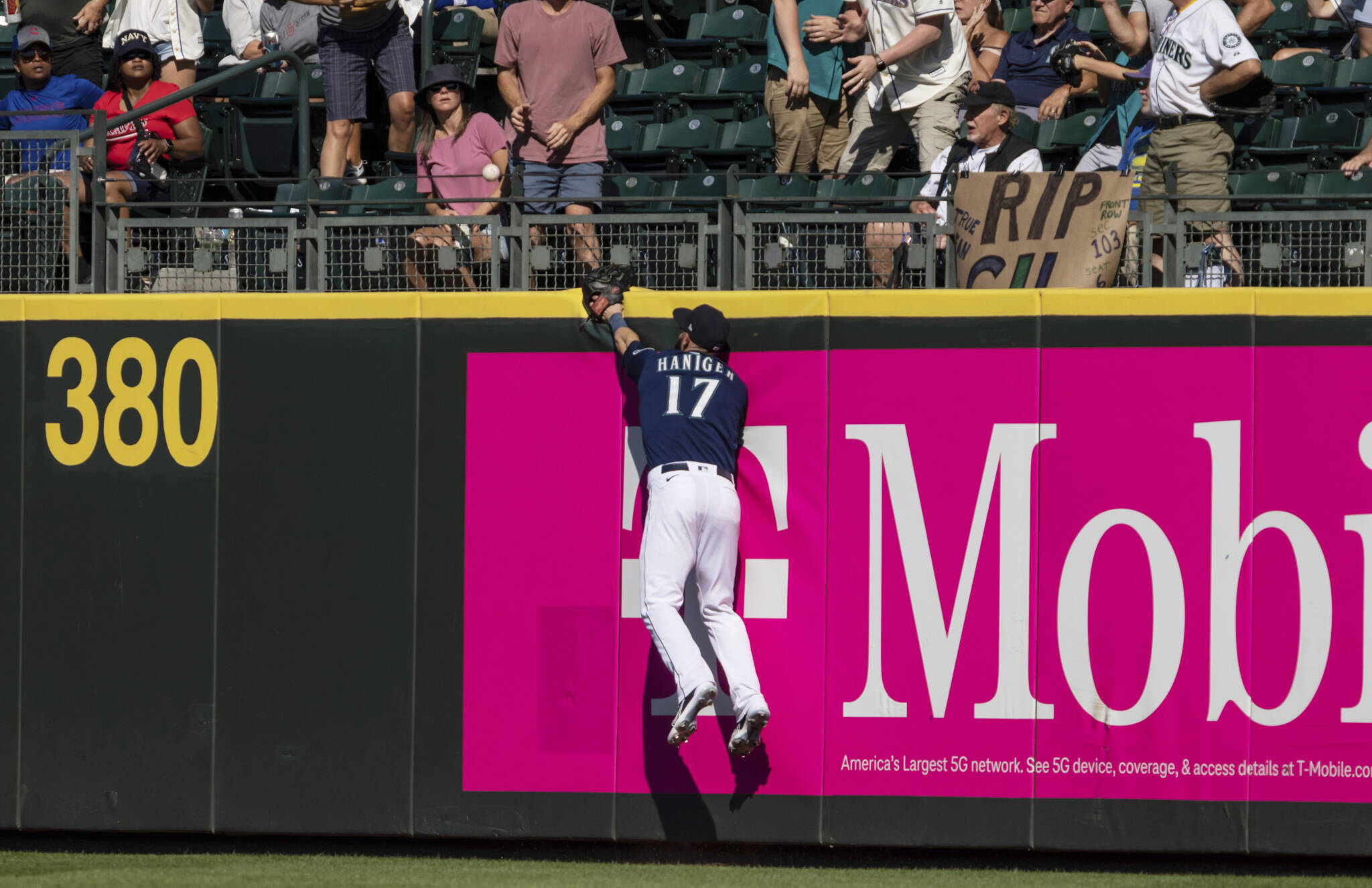 Mariners outfielder Mitch Haniger cannot reach to a home run hit by the Nationals’ Ildemaro Vargas during the ninth inning of a game Wednesday in Seattle. (AP Photo/Stephen Brashear)