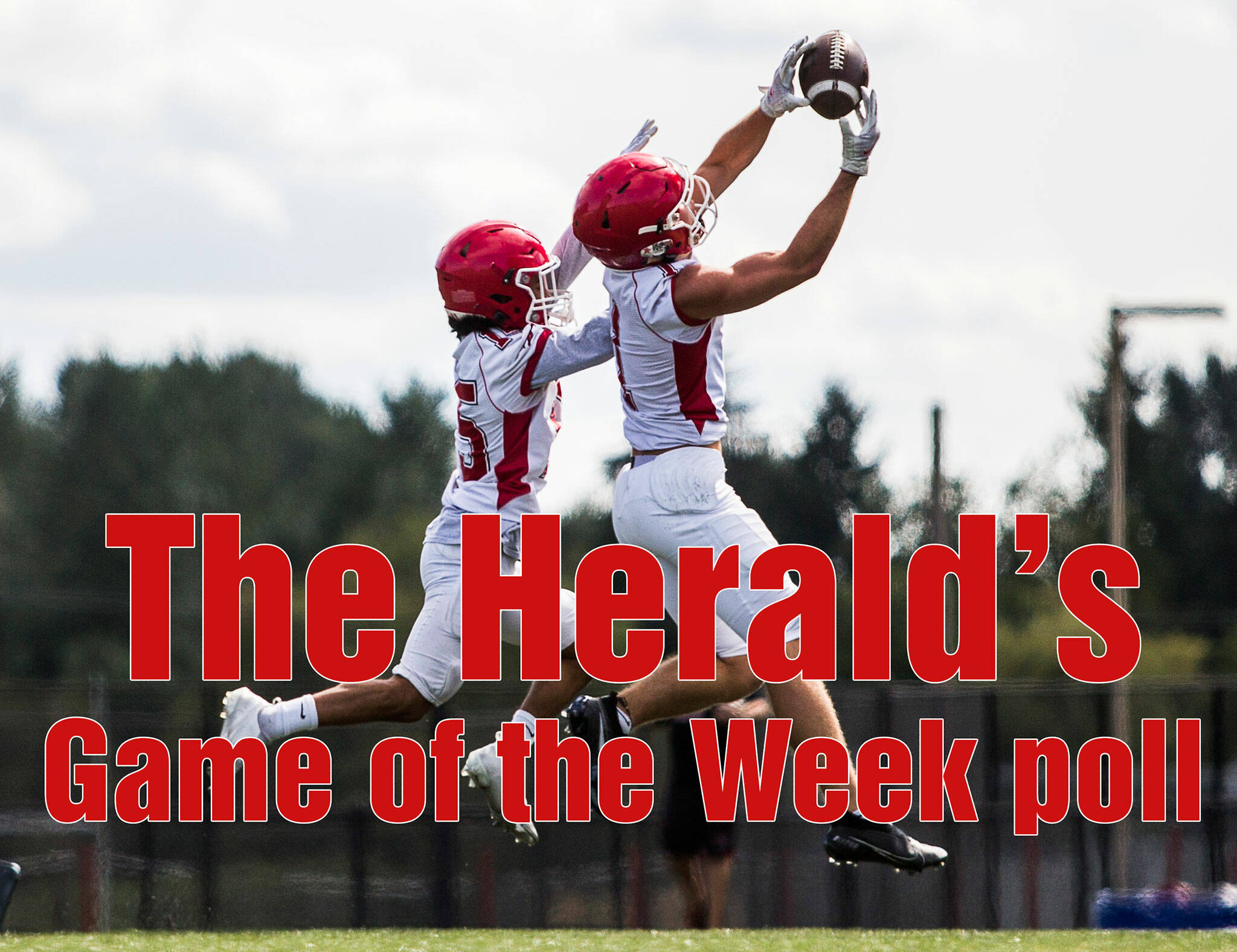 Marysville-Pilchuck’s Darren Johnson-Jones, left, tries to block a pass to Miguel Chavez, right, during football practice on Thursday, Aug. 19, 2021 in Marysville, Wash. (Olivia Vanni / The Herald)