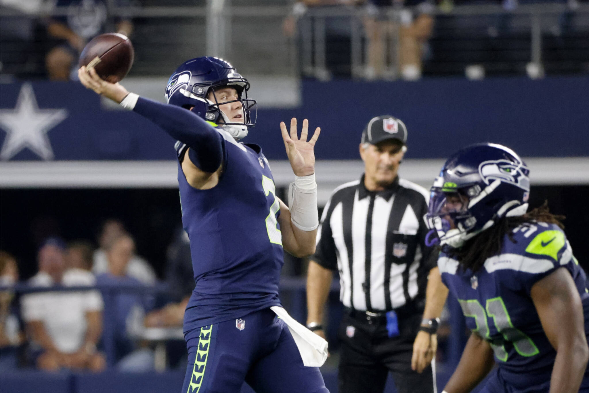 Seattle Seahawks quarterback Drew Lock (2) throws a pass in the first half of Friday’s preseason game against the Dallas Cowboys in Arlington, Texas. (AP Photo/Michael Ainsworth)