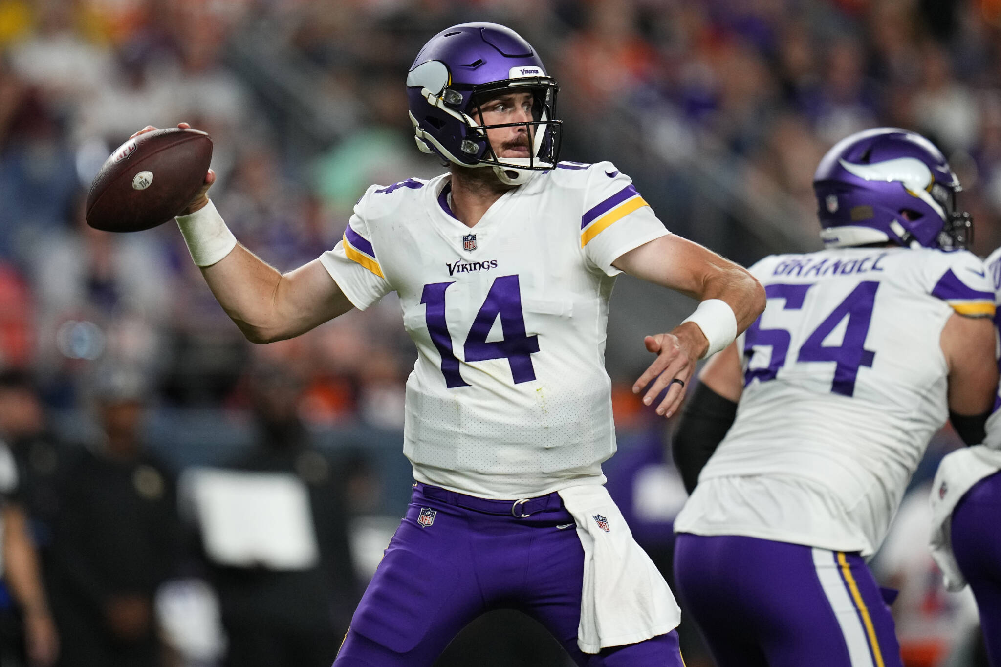 Vikings quarterback Sean Mannion throws against the Broncos during the first half of a preseason game on Aug. 27 in Denver. (AP Photo/Jack Dempsey)
