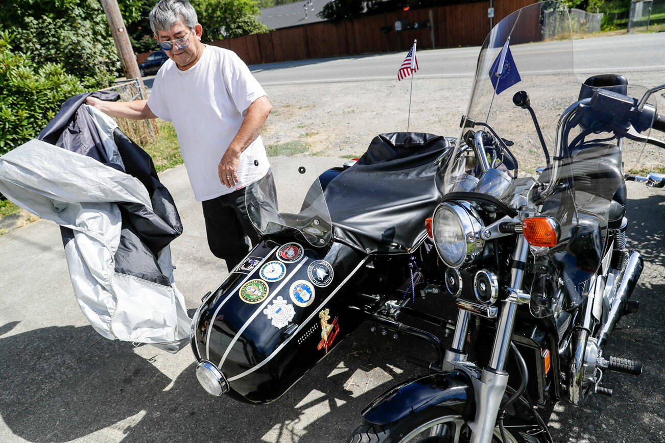 Walt Jackson, a Granite Falls veteran, has attached a rare sidecar to his Honda Shadow which allows his wife, who suffered a stroke, to take ride along. Photographed Tuesday morning in Granite Falls, Washington on August 16, 2022. (Kevin Clark / The Herald)