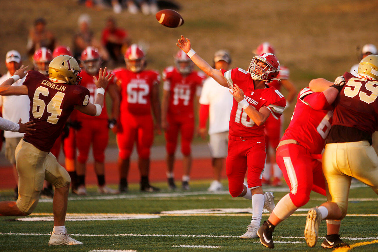 Stanwood’s Michael Mascotti tries a deep ball against Lakewood on Friday, Sep. 2, 2022, at Lakewood High School in Arlington, Washington. (Ryan Berry / The Herald)