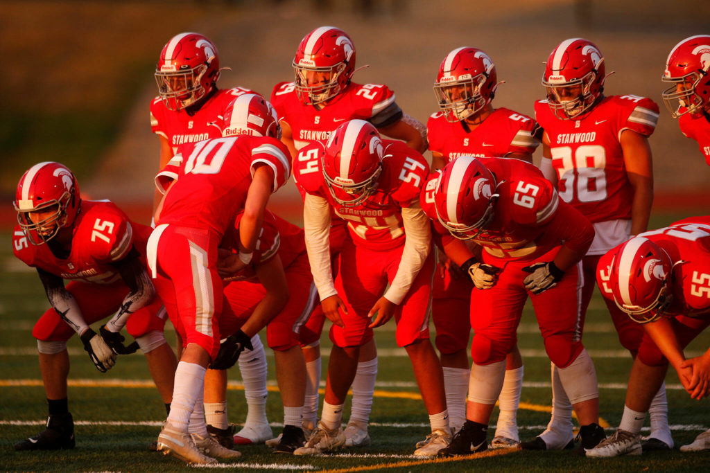 Stanwood gathers pre-snap against Lakewood on Friday, Sep. 2, 2022, at Lakewood High School in Arlington, Washington. (Ryan Berry / The Herald)
