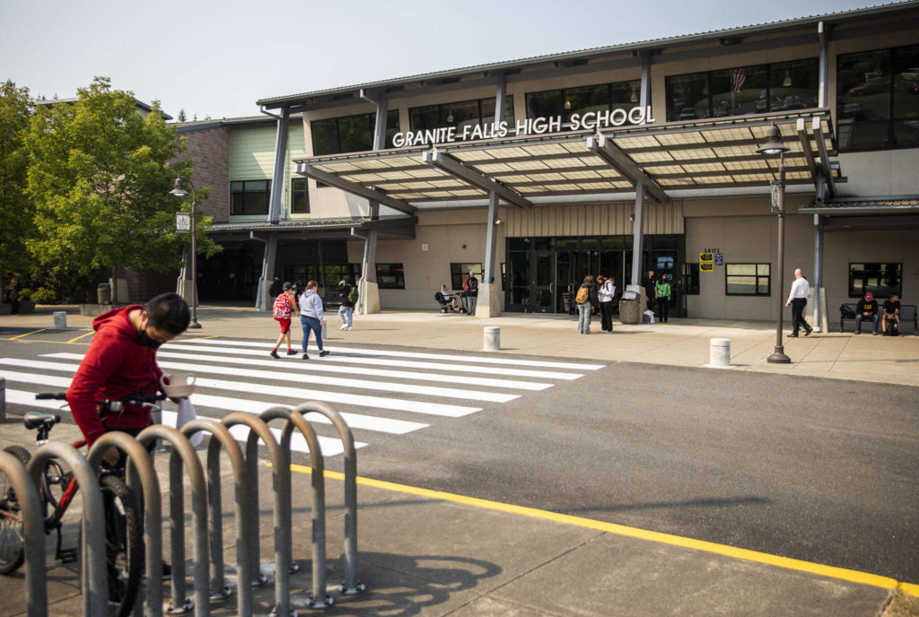 People enter and exit Granite Falls High School after school gets out on Sept. 9, in Granite Falls. (Olivia Vanni / The Herald)
