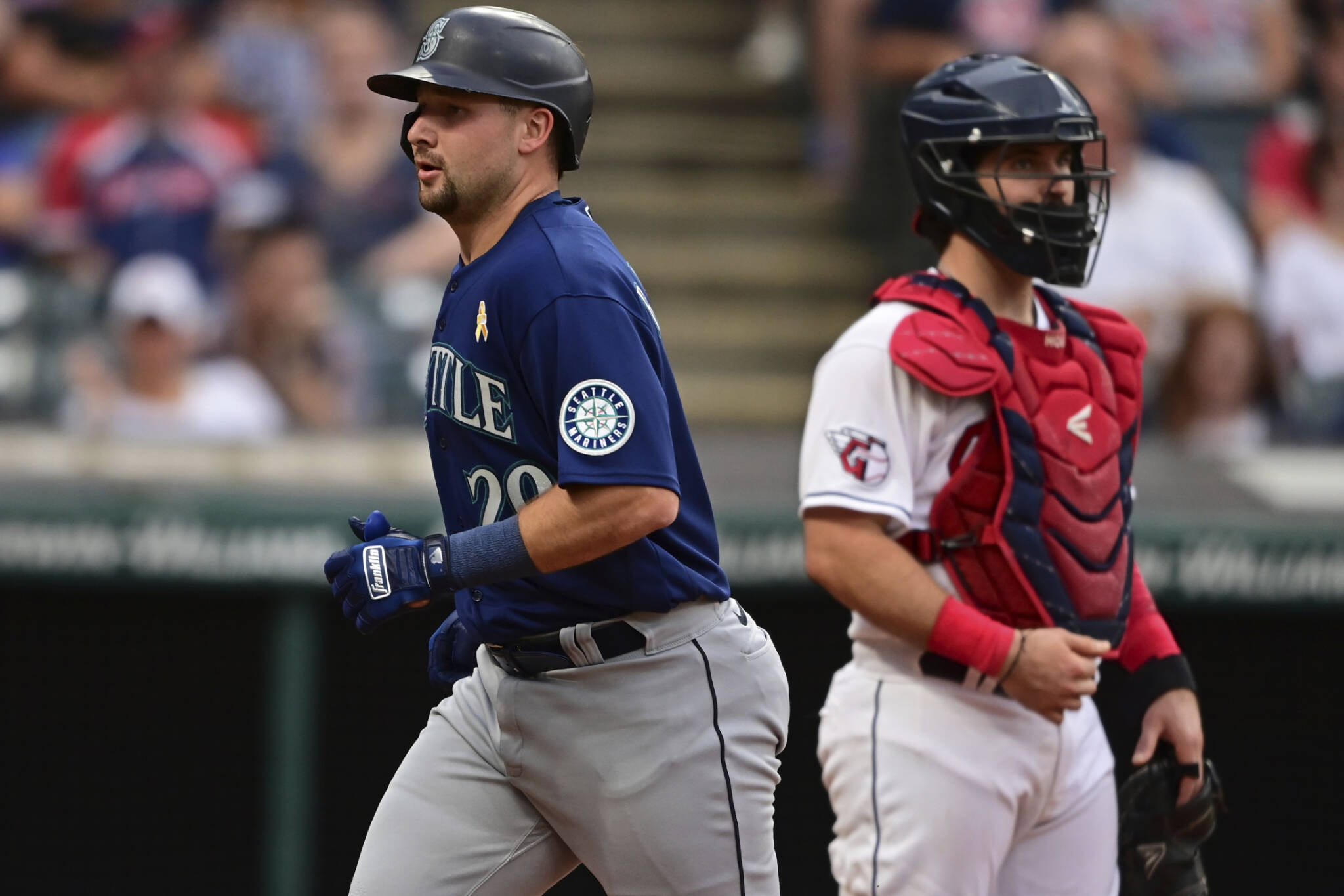 The Mariners’ Cal Raleigh runs the bases after hitting a solo home run off Guardians pitcher Cody Morris during the second inning of a game Friday in Cleveland. (AP Photo/David Dermer)