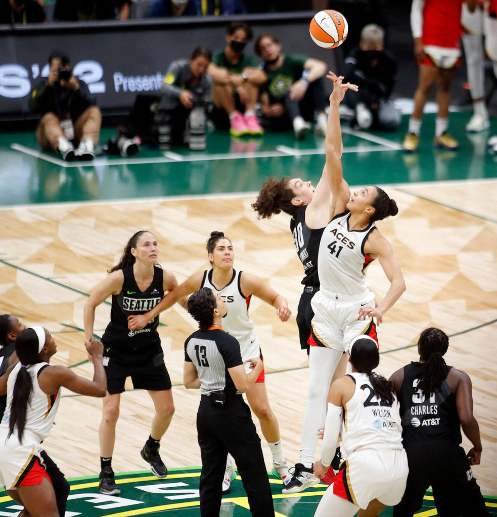 Overtime tips off during a WNBA playoff game between the Storm and the Las Vegas Aces on Sunday, Sep. 4, 2022, at Climate Pledge Arena in Seattle, Washington. (Ryan Berry / The Herald)
