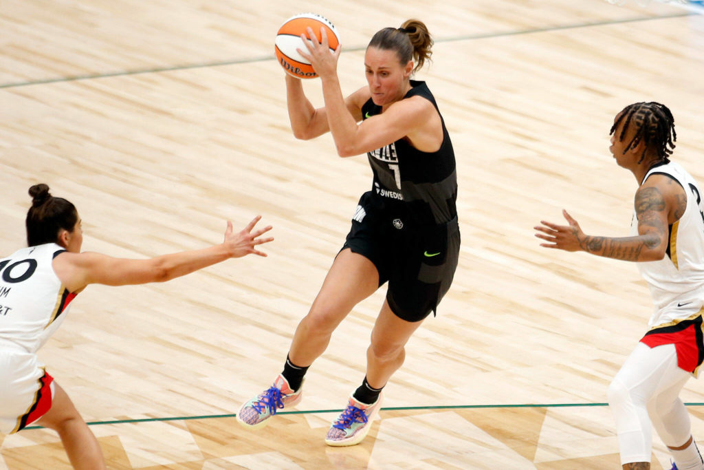 The Seattle Storm’s Stephanie Talbot cuts through the defense during a WNBA playoff game against the Las Vegas Aces on Sunday, Sep. 4, 2022, at Climate Pledge Arena in Seattle, Washington. (Ryan Berry / The Herald)
