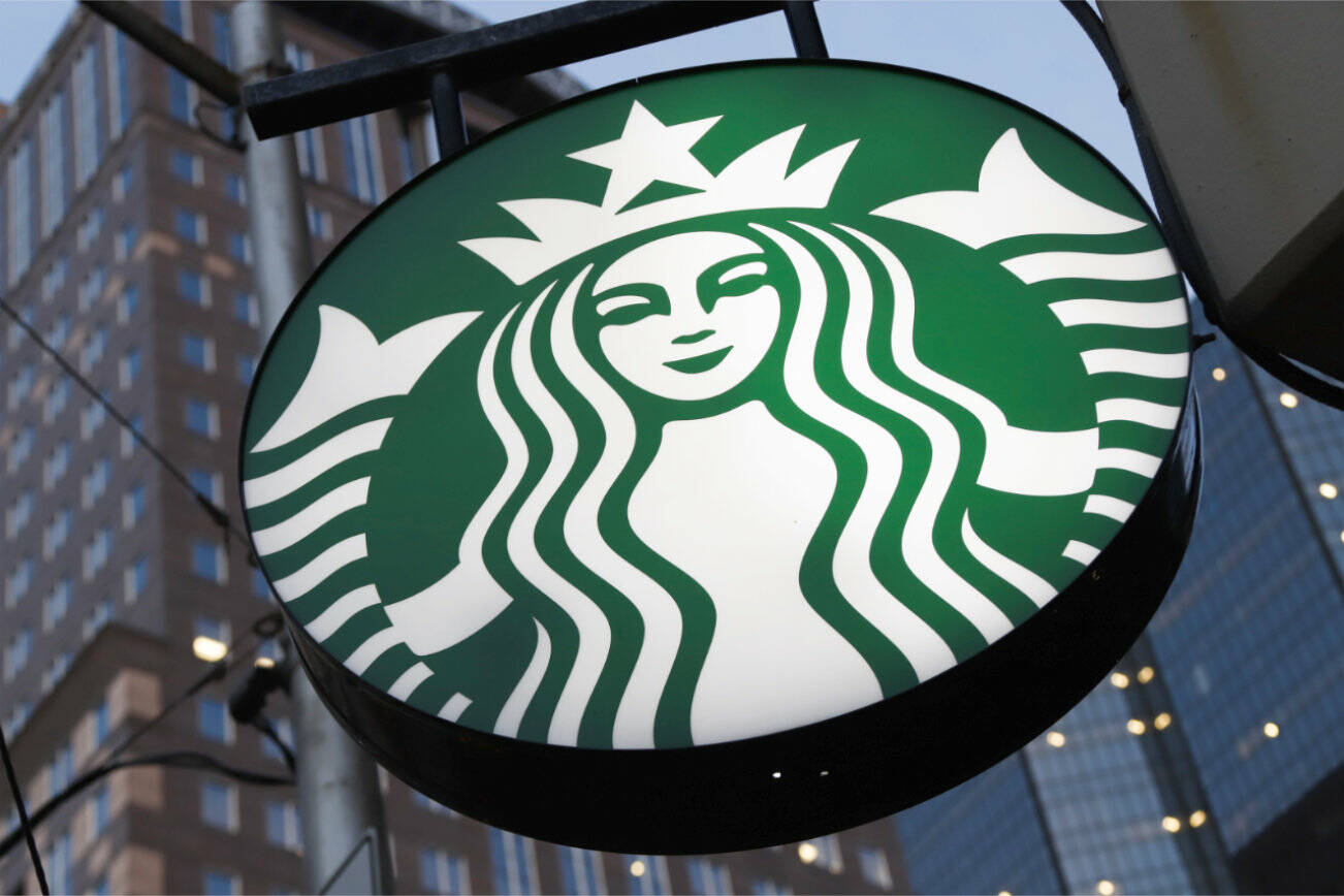 FILE - A Starbucks sign hangs outside a Starbucks coffee shop in downtown Pittsburgh on June 26, 2019. The coffee giant said Thursday, Sept. 1, 2022, that longtime PepsiCo executive Laxman Narasimhan will join Starbucks on Oct. 1, after relocating from London to Seattle, where Starbucks is based. (AP Photo/Gene J. Puskar, File)