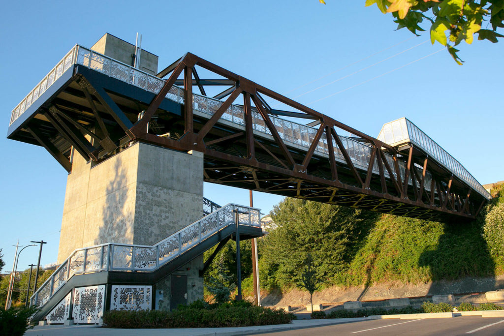 The Grand Ave Park Bridge is seen as the sun sets Wednesday, in Everett. (Ryan Berry / The Herald)
