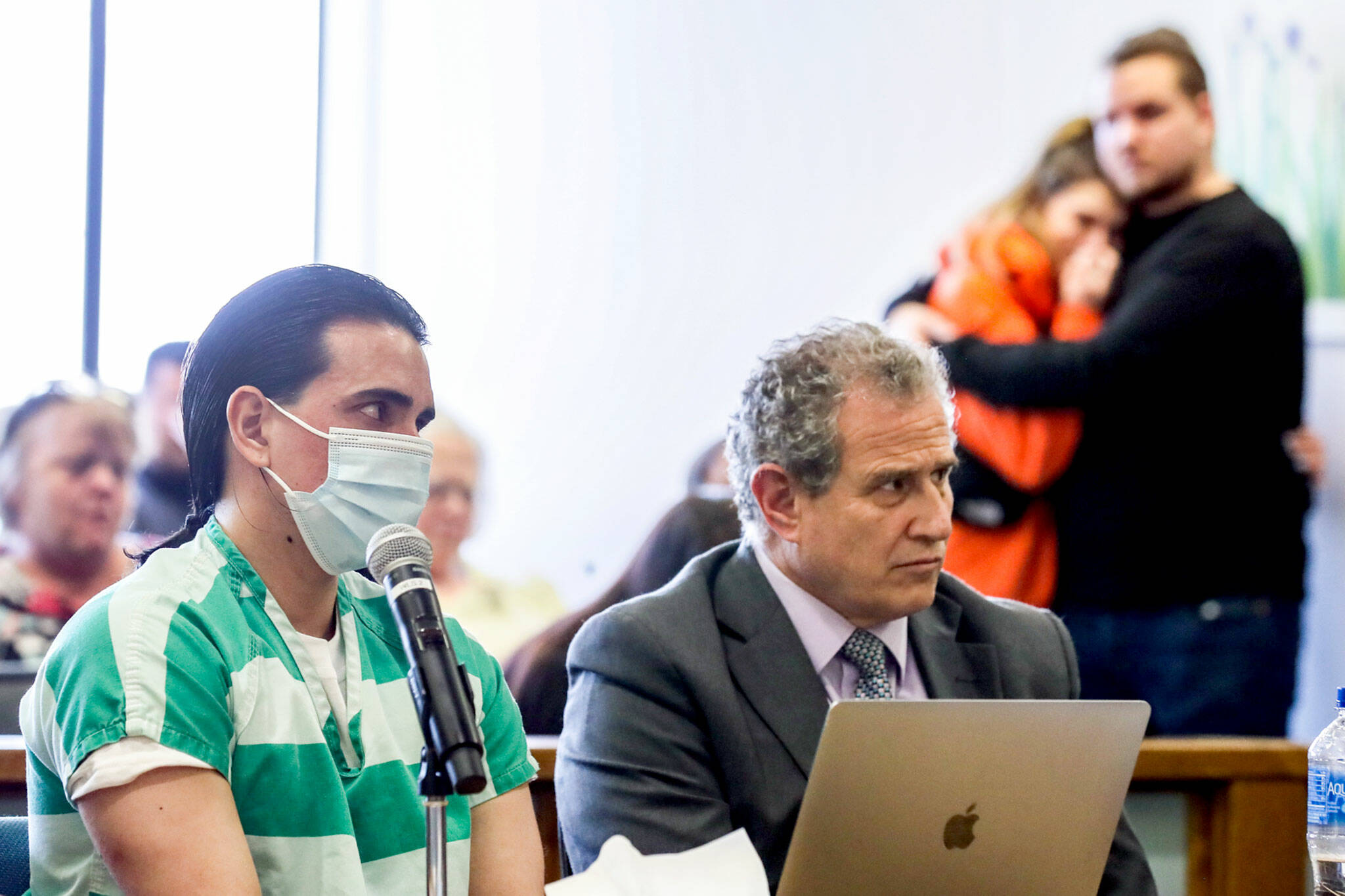 Homero Osuna Gonzalez, left, during his sentencing for the murder of his wife, Madison King, with her family and friends in the gallery on Monday, at the Snohomish County Courthouse in Everett. (Kevin Clark / The Herald)