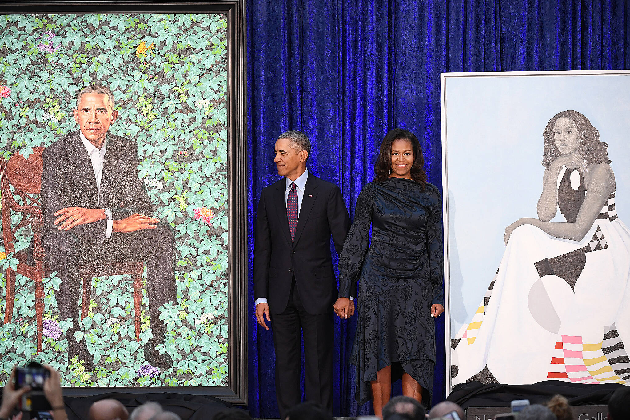 The Obama portraits by Kehinde Wiley and Amy Sherald at the National Portrait Gallery draw attention to the individuals rather than the office of the presidency or the role of the first lady. MUST CREDIT: Washington Post photo by Matt McClain.