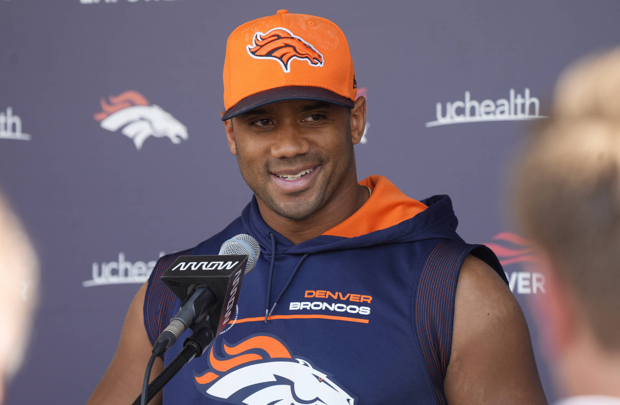 Broncos quarterback Russell Wilson responds to a question during a news conference Thursday at the Broncos’ headquarters in Centennial, Colo. (AP Photo/David Zalubowski)