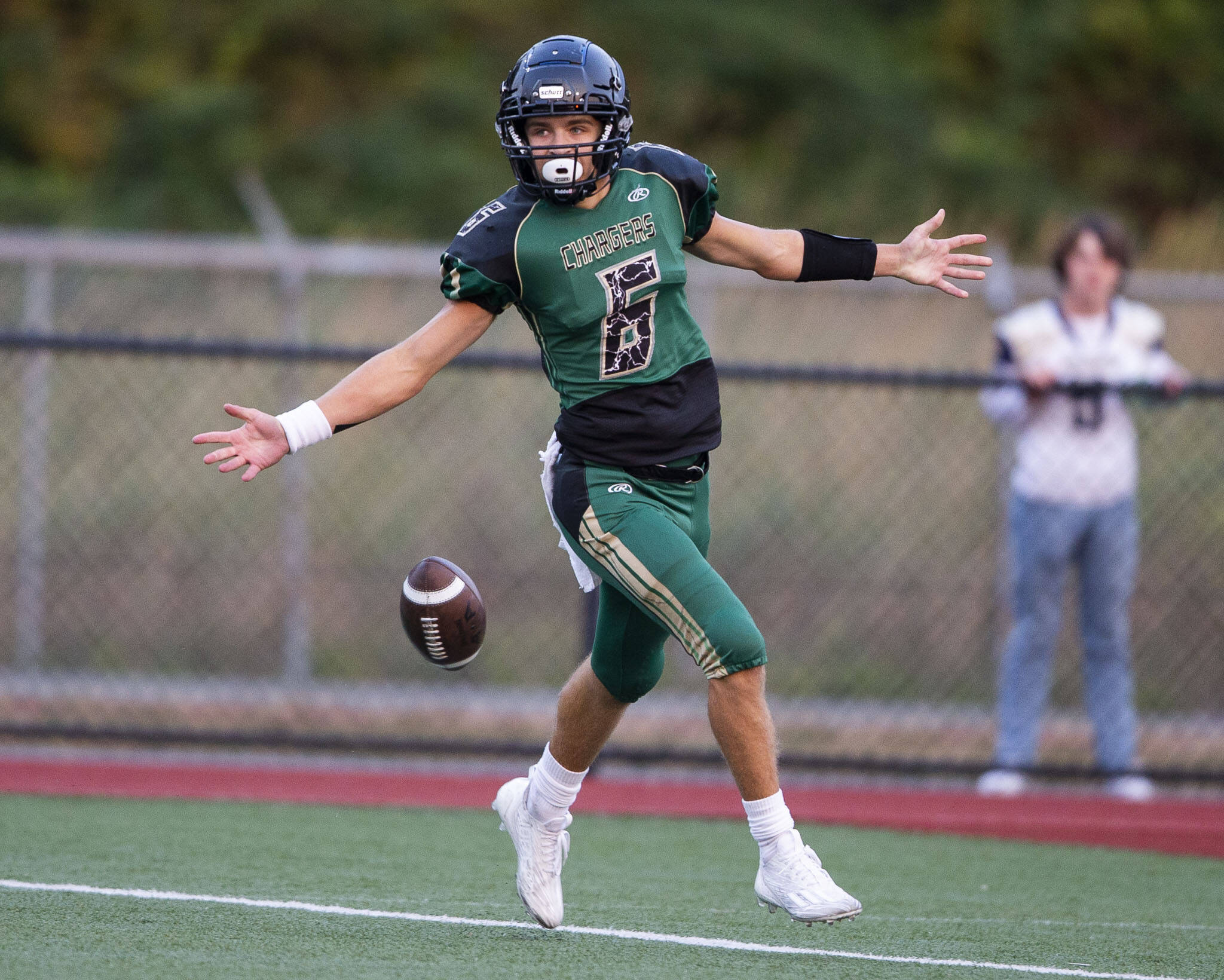 Marysville Getchell’s Carter Schmidt celebrates after getting a touchdown during the game against Arlington on Friday, Sept. 9, 2022 in Marysville, Washington. (Olivia Vanni / The Herald)