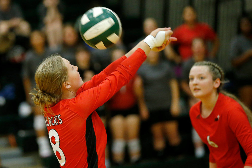 Archbishop Murphy’s Natalie Russell makes a play and sends the ball behind her back against Shorecrest on Wednesday, Sep. 14, 2022, at Shorecrest High School in Shoreline, Washington. (Ryan Berry / The Herald)
