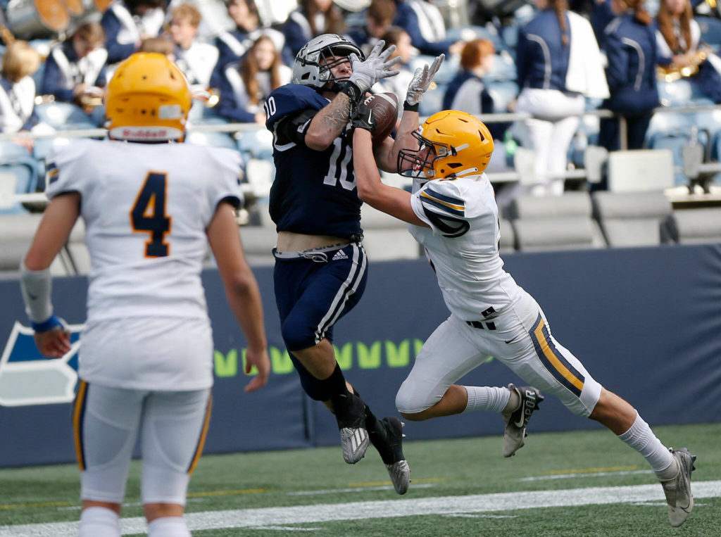 Glacier Peak’s Ryan King comes down with a tough touchdown reception against Ferndale on Saturday, Sep. 17, 2022, at Lumen Field in Seattle, Washington. (Ryan Berry / The Herald)

