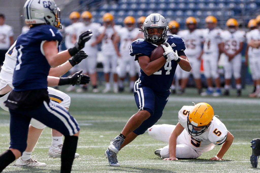 Glacier Peak’s Roman Foster finds some space to run against Ferndale on Saturday, Sep. 17, 2022, at Lumen Field in Seattle, Washington. (Ryan Berry / The Herald)
