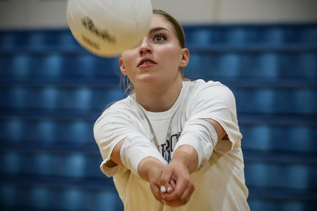 Stephanie Grimes digs during practice Monday afternoon at Meadowdale High School in Lynnwood, Washington on September 19, 2022. (Kevin Clark / The Herald)
