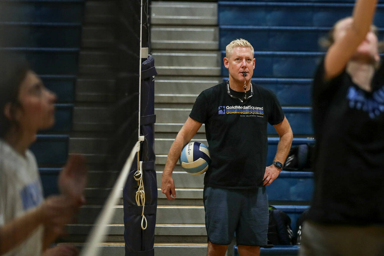 Bart Foley, head coach, watches the play during practice Monday afternoon at Meadowdale High School in Lynnwood, Washington on September 19, 2022. (Kevin Clark / The Herald)