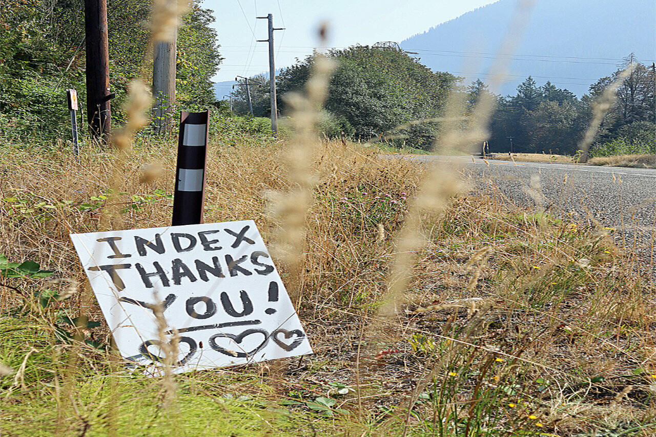 Handmade signs along U.S. 2 thanked firefighters for the efforts to control the Bolt Creek wildfire. (Edie Everette)