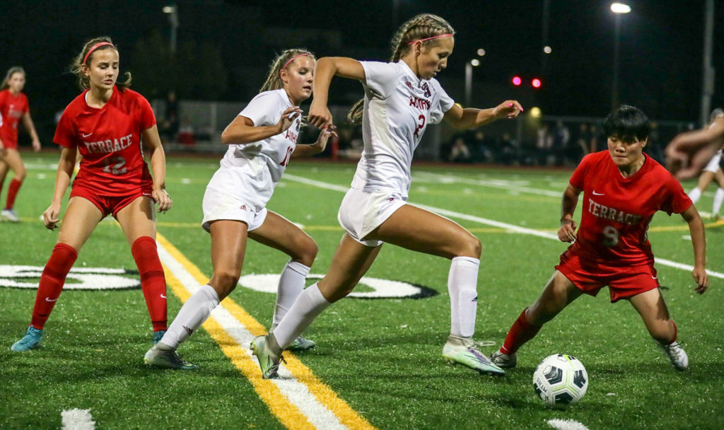 Archbishop Murphy’s Chloe McCoy races to control the ball Thursday night at Lynnwood High School in Lynnwood, Washington on September 22, 2022. The Hawks and Wildcats finished the match with 1-1 tie. (Kevin Clark / The Herald)
