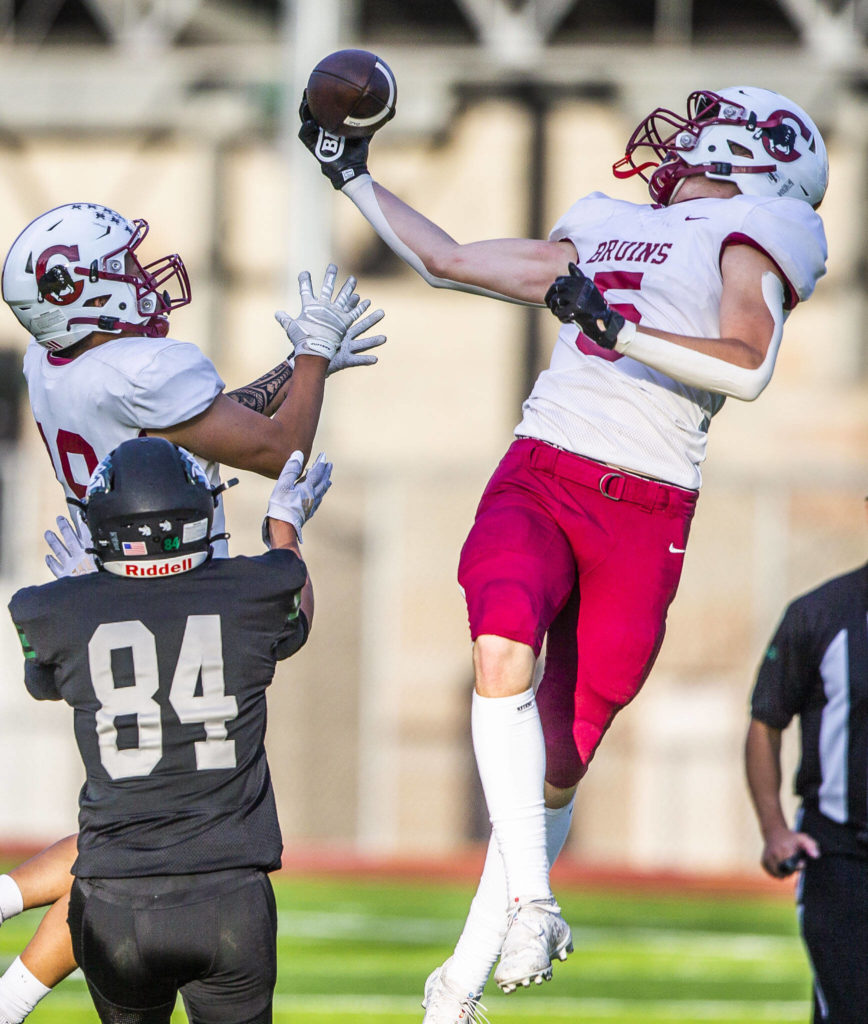 Cascade’s Devin Gilbert makes a one handed catch for an interception during the game against Jackson on Friday, Sept. 23, 2022 in Everett, Washington. (Olivia Vanni / The Herald)
