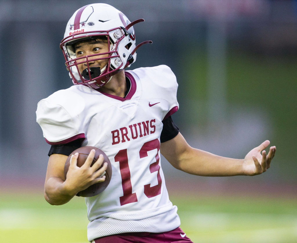 Cascade’s Wen Zhang celebrates his touchdown during the game against Jackson on Friday, Sept. 23, 2022 in Everett, Washington. (Olivia Vanni / The Herald)
