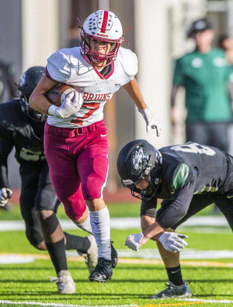 Cascade’s Zach Lopez escapes a tackle during the game against Jackson on Friday, Sept. 23, 2022 in Everett, Washington. (Olivia Vanni / The Herald)
