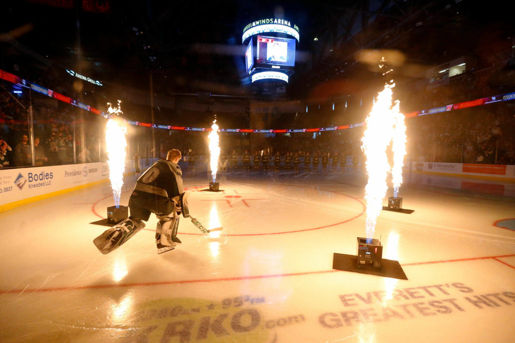 Everett Silvertips goaltender Braden Holt skates onto the ice during introductions before the season opener against the Vancouver Giants on Saturday, Sep. 24, 2022, at Angel of the Winds Arena in Everett, Washington. (Ryan Berry / The Herald)