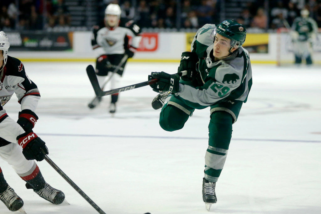 Everett Silvertips’ Vincent Lamanna puts the puck on net during the season opener against the Vancouver Giants on Saturday, Sep. 24, 2022, at Angel of the Winds Arena in Everett, Washington. (Ryan Berry / The Herald)
