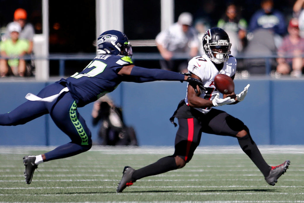 The Atlanta Falcons’ Olimade Zaccheaus grabs a long reception against the Seattle Seahawks on Sunday, Sep. 25, 2022, at Lumen Field in Seattle, Washington. (Ryan Berry / The Herald)

