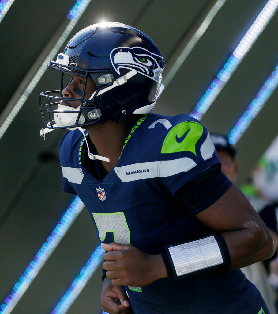 The Seattle Seahawks’ Geno Smith enters the field against the Atlanta Falcons on Sunday, Sep. 25, 2022, at Lumen Field in Seattle, Washington. (Ryan Berry / The Herald)
