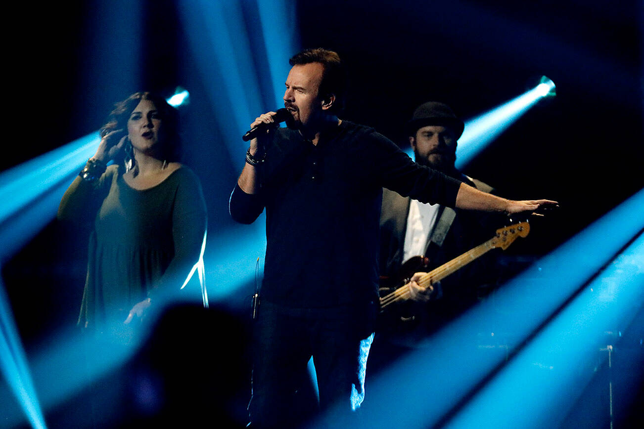 Mark Hall, center, and Casting Crowns perform during the Dove Awards on Tuesday, Oct. 15, 2019, in Nashville, Tenn. (AP Photo / Mark Humphrey)