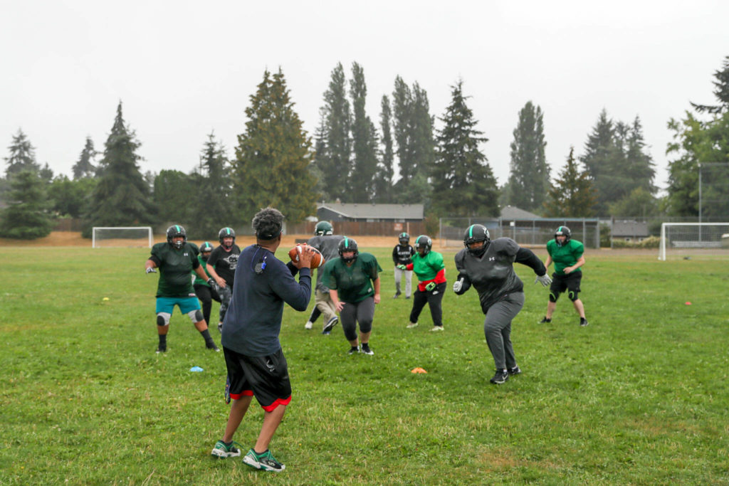 The Seattle Spartans practice on Sept. 3, in Shoreline. (Kevin Clark / The Herald)
