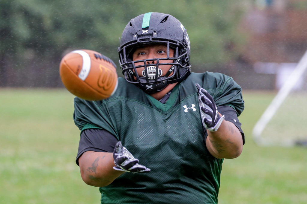 Ines Cuevas makes a catch during practice on Sept. 3, in Shoreline. (Kevin Clark / The Herald)
