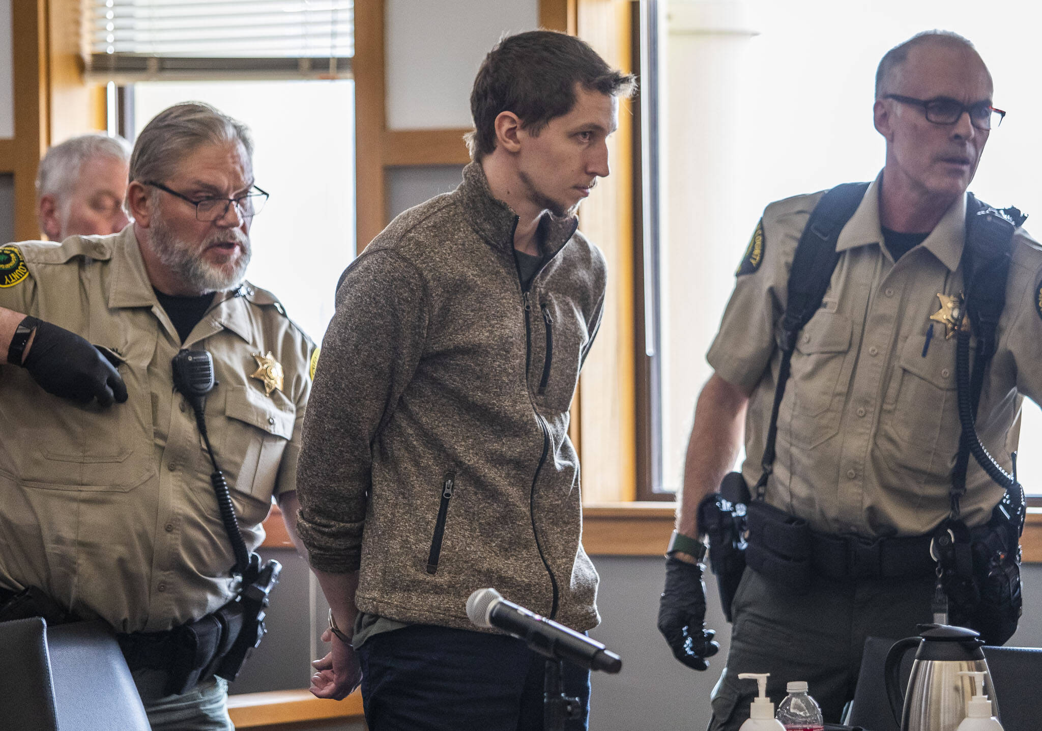 Cole Krause is handcuffed after being sentenced to 17 1/2 years in prison for four counts of felony sexual assault on Wednesday, in Everett. (Olivia Vanni / The Herald)