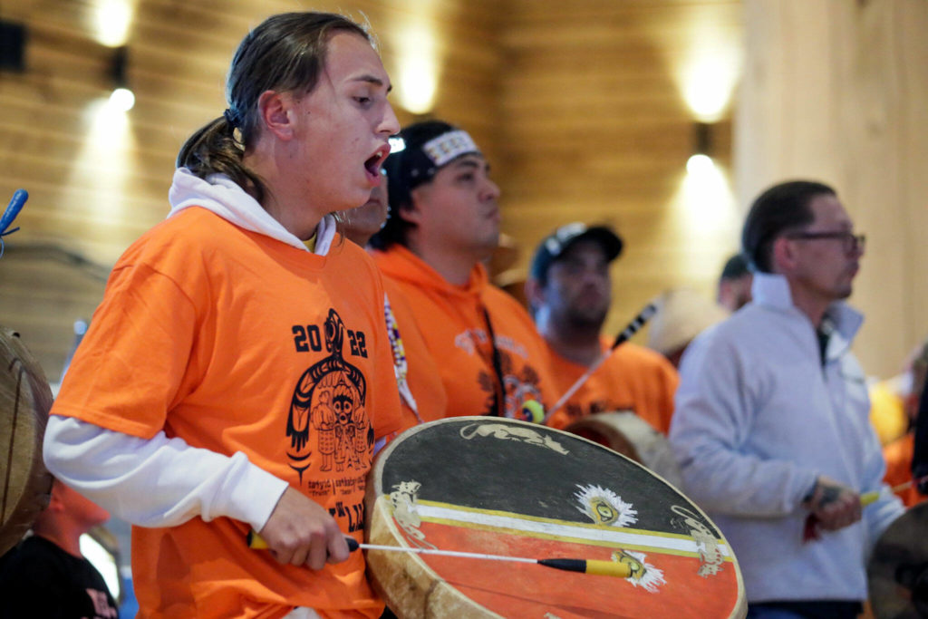 Tarynn Fryberg sings to start an assemble for the National Day for Truth and Reconciliation and Orange Shirt Day Friday evening at Tulalip Gathering Hall on Sept. 30, in Tulalip. (Kevin Clark / The Herald)
