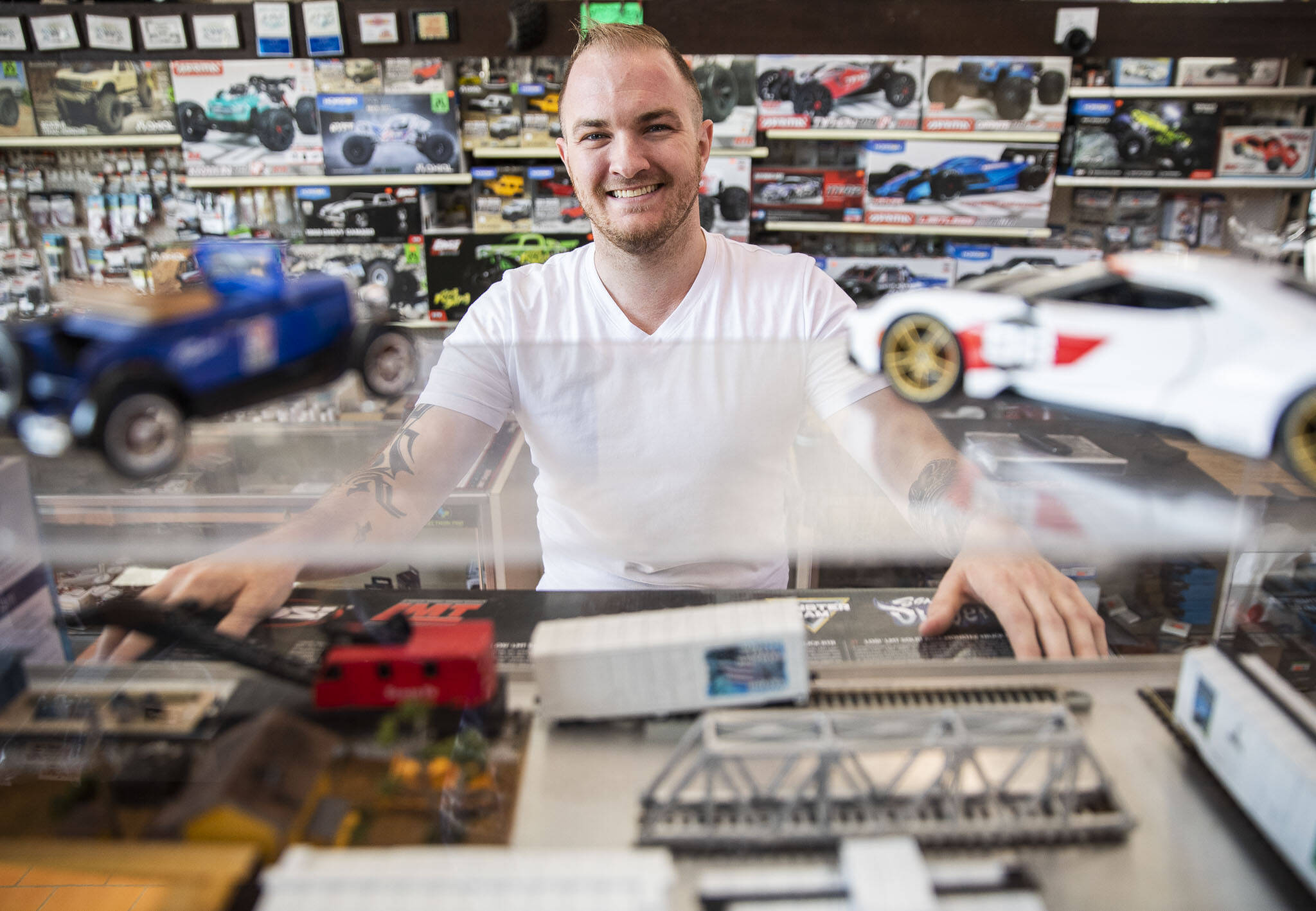 Travis Lovestedt, the new owner of Broadway Hobbies, inside his shop on Sept. 26, in Everett. (Olivia Vanni / The Herald)